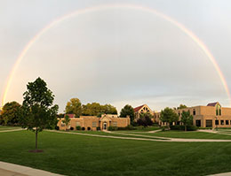 Photo of a rainbow over campus. Links to Gifts of Cash, Checks, and Credit Cards